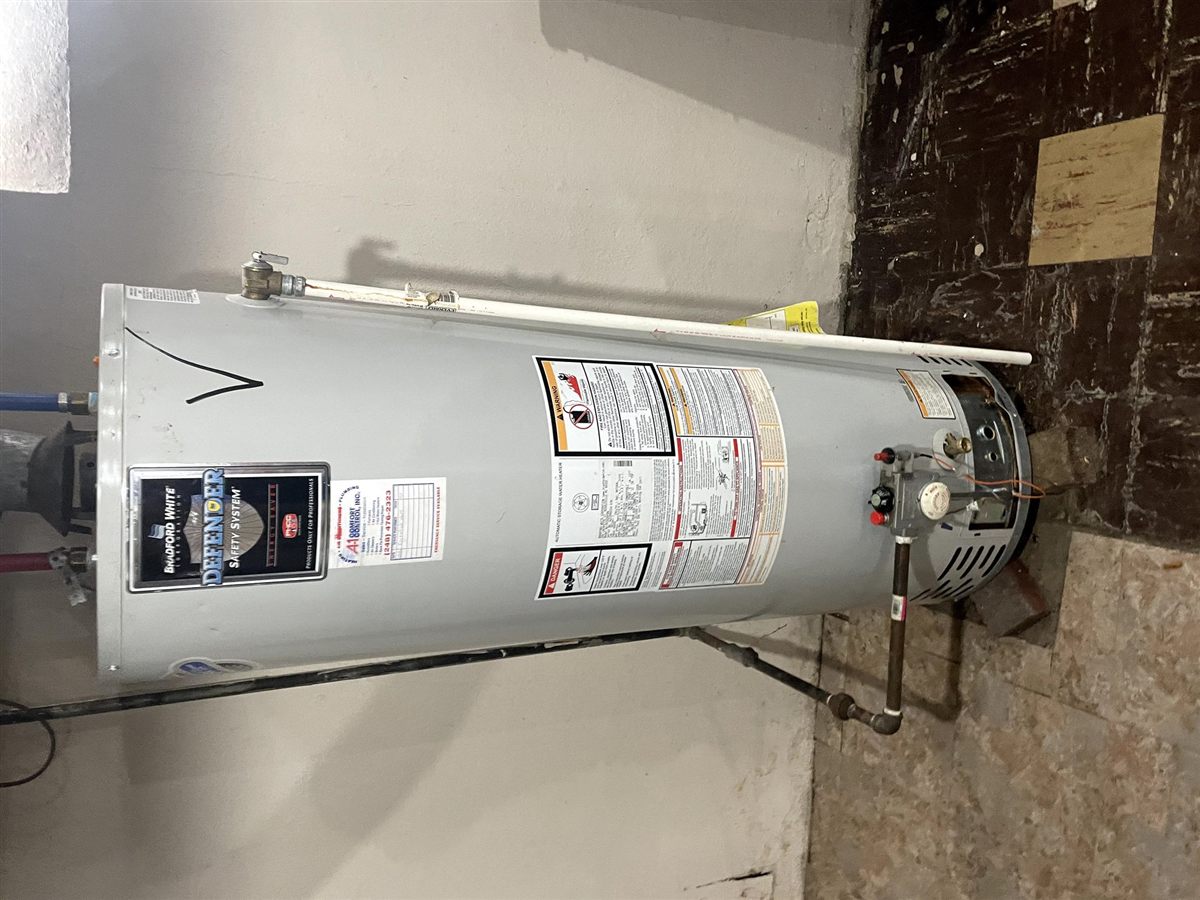 Bradford White water heater installation in basement